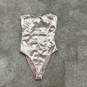 Only worn once strapless body suit